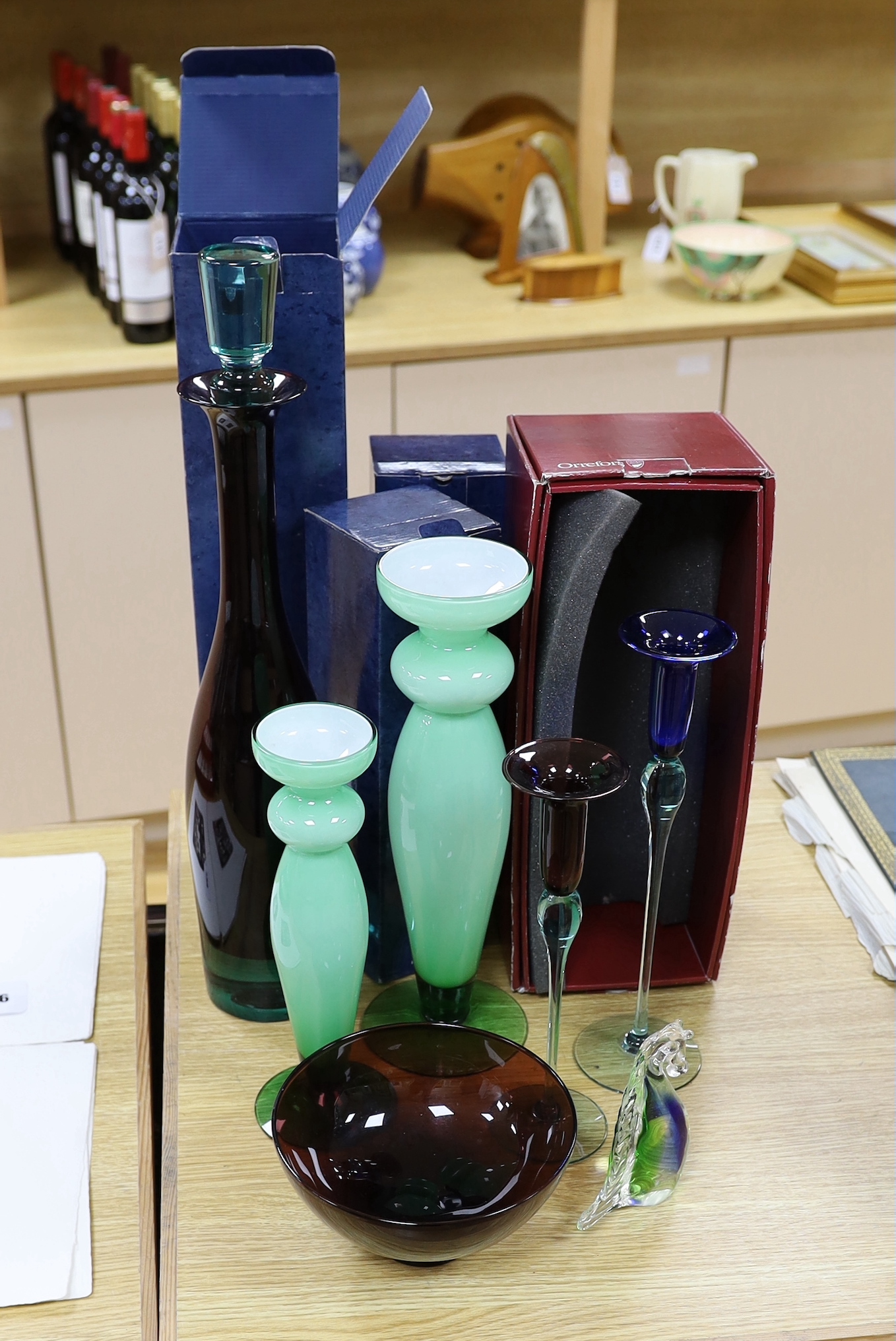 A quantity of various glass to include a Royal Copenhagen Harlekin glass decanter, two candlesticks, another pair of candlesticks, a bowl etc.